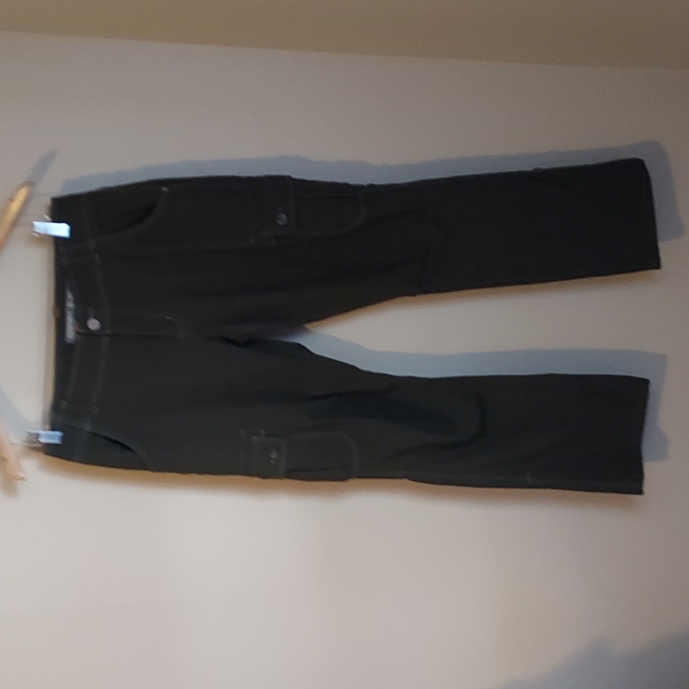 Women's Icebreaker Merino Wool Pants With Cargo Pockets On The Side.